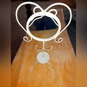 Meta mirror stand that also holds jewelry